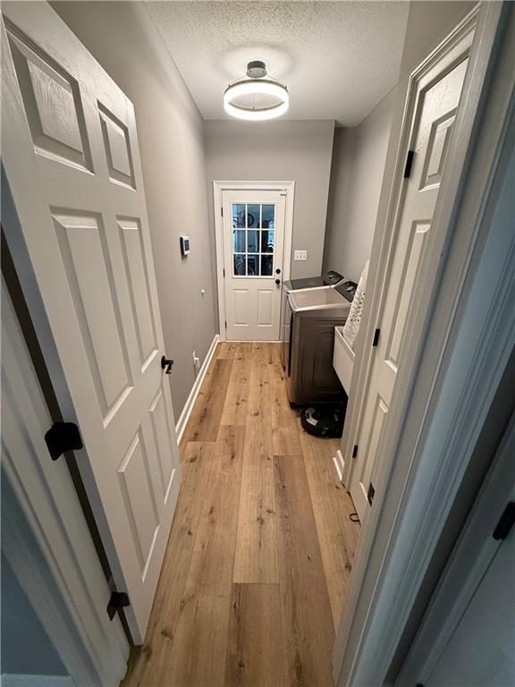4632 Ridgeview Circle Valdosta, GA 31602 - Photo 39 of 70 a view of a hallway with furniture and wooden floor