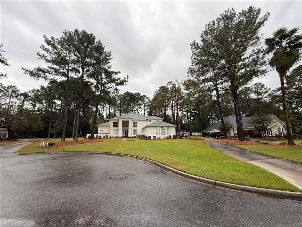 4632 Ridgeview Circle Valdosta, GA 31602 - Photo 4 of 70 a view of a playground with basketball court