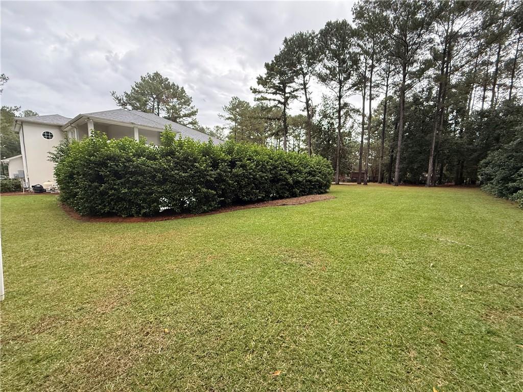 4632 Ridgeview Circle Valdosta, GA 31602 - Photo 56 of 70 a view of a field with an trees