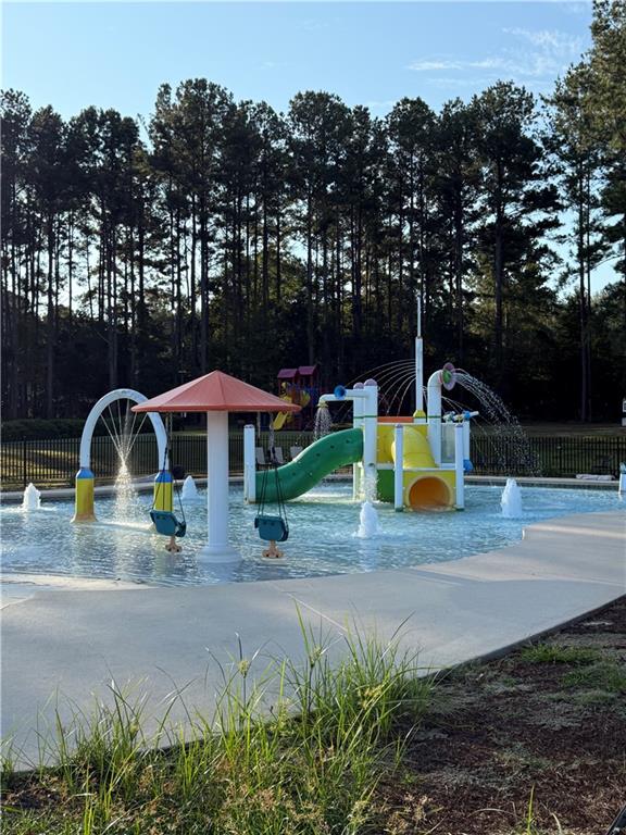 4632 Ridgeview Circle Valdosta, GA 31602 - Photo 69 of 70 a view of backyard with swimming pool and seating space