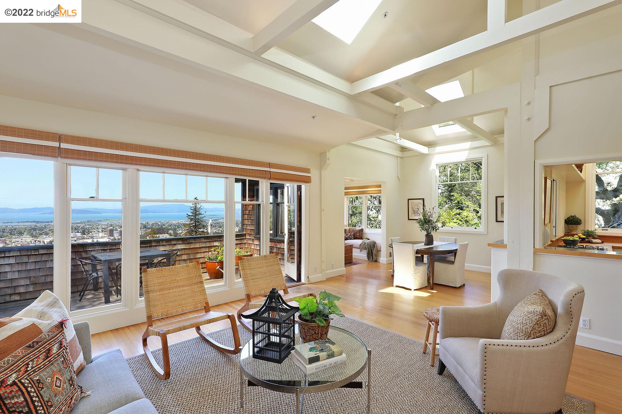 260 Panoramic Way Berkeley, CA 94704 - Photo 1 of 1 a living room with furniture and a large window