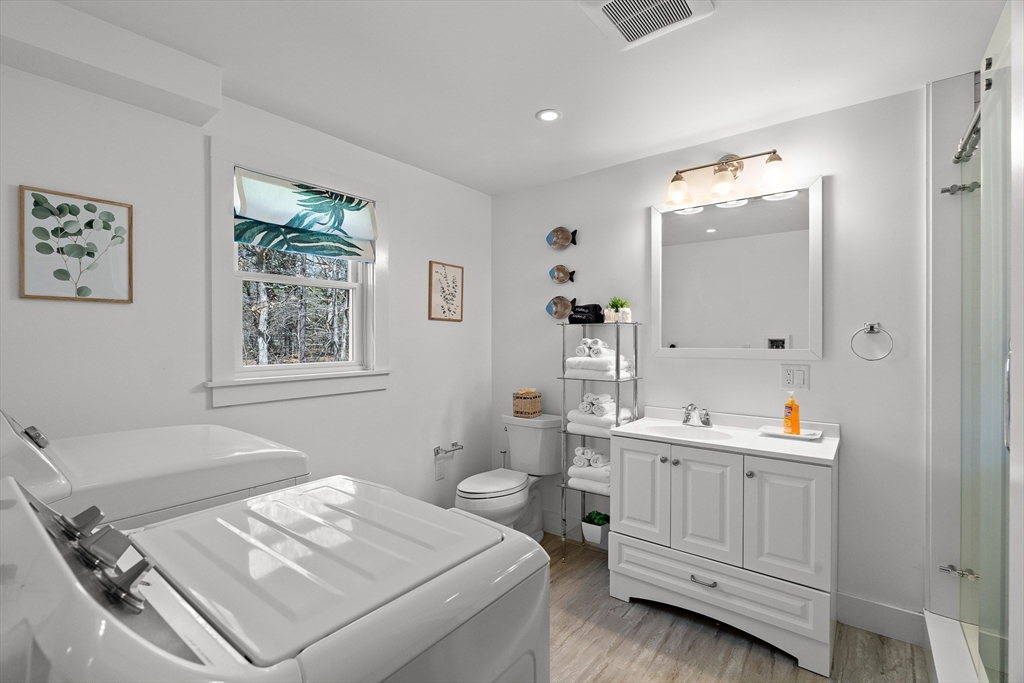 13 Young Street Edgartown, MA 02539 - Photo 18 of 29 a room with a bed and a window
