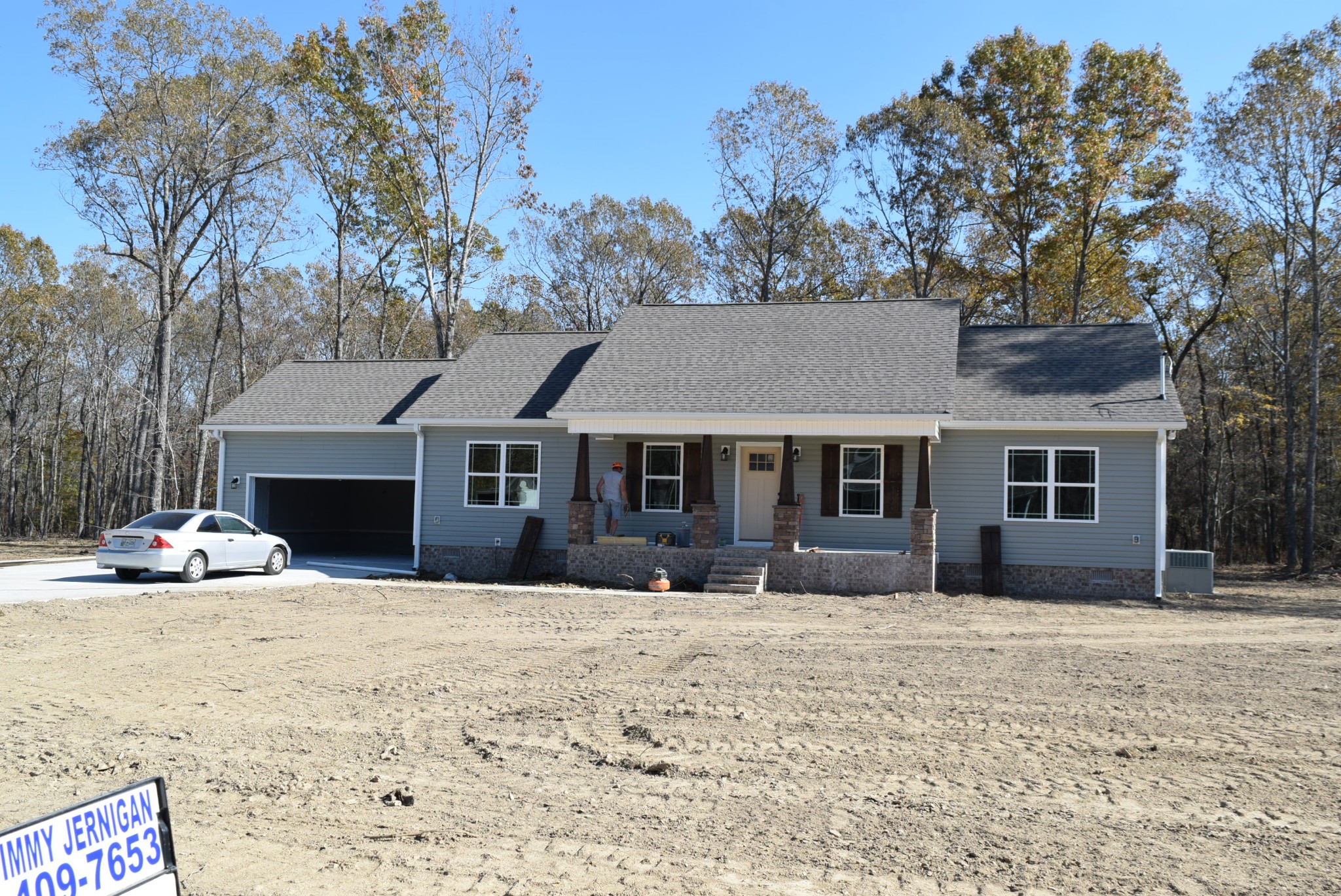 487 Ballard Road Manchester, TN 37355 - Photo 1 of 8 a front view of a house with a yard covered in snow