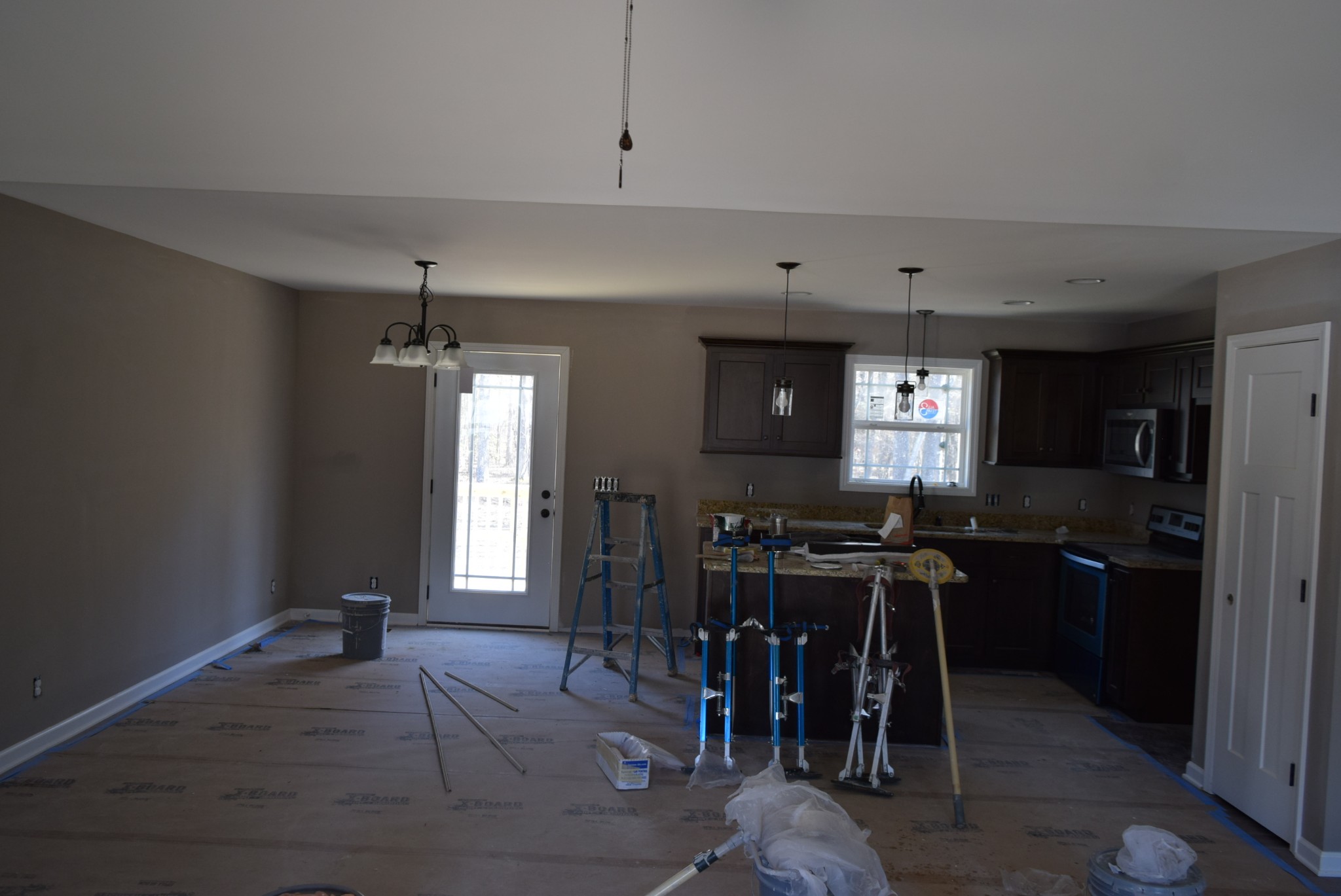 487 Ballard Road Manchester, TN 37355 - Photo 2 of 8 a view of a dining room with furniture and chandelier