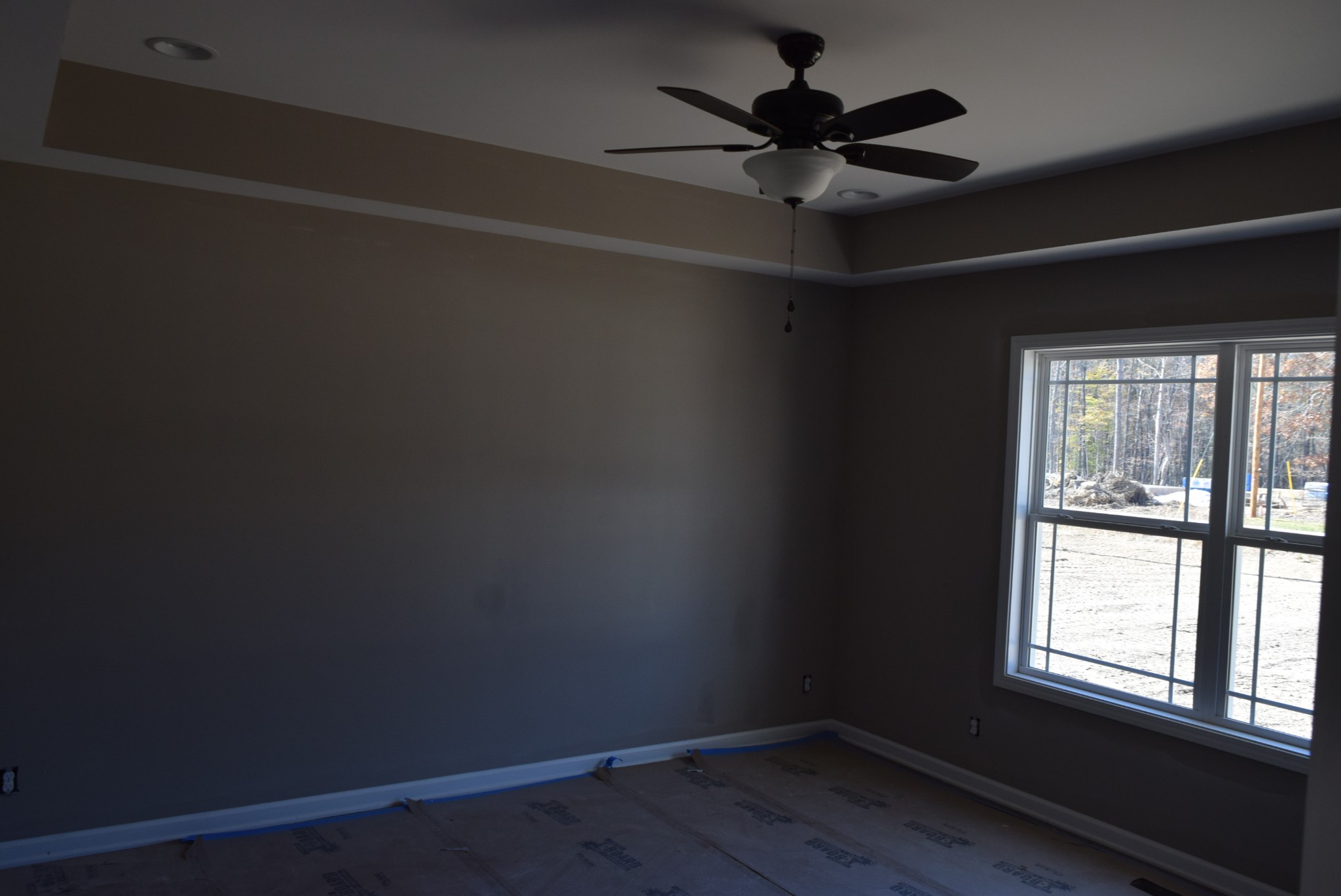 487 Ballard Road Manchester, TN 37355 - Photo 3 of 8 an empty room with a window and a fan