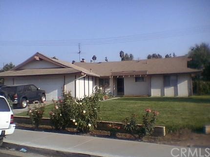 10740 Mercer Avenue Riverside, CA 92505 - Photo 1 of 1 a house view with a garden space