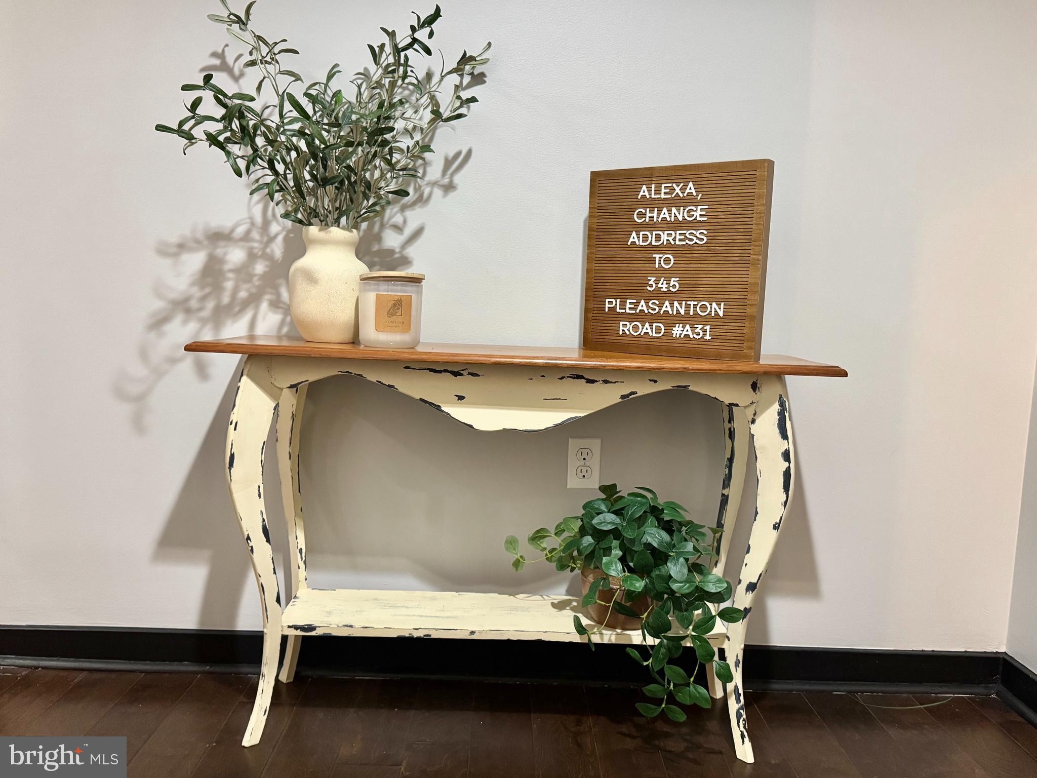 345 Pleasanton Road, Unit A31 Westminster, MD 21157 - Photo 15 of 16 a bench sitting in a room next to a window