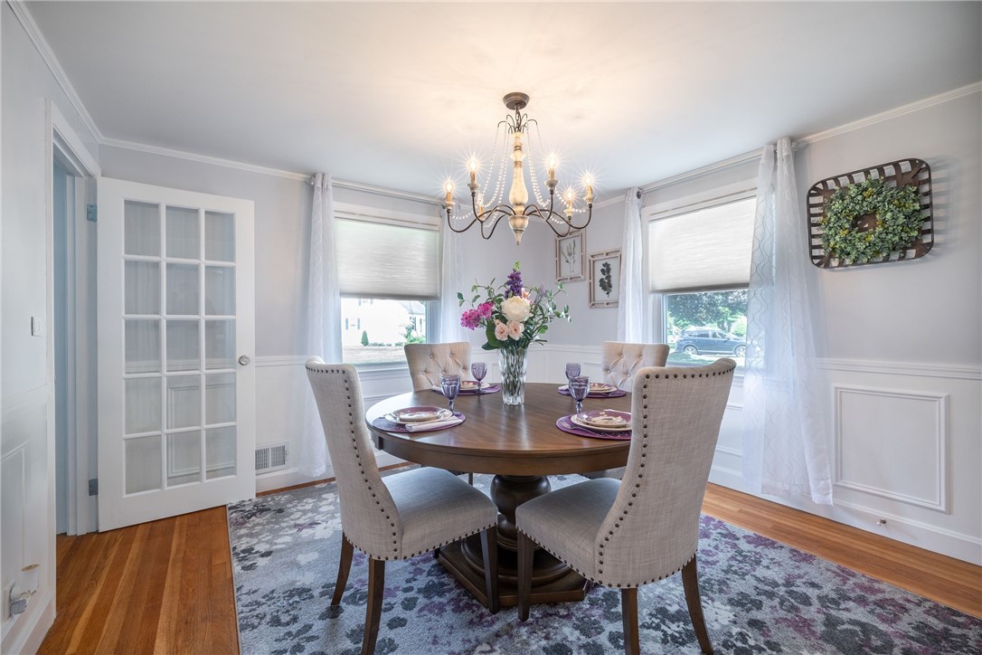 61 Knowles Drive Warwick, RI 02888 - Photo 12 of 43 Gorgeous dining room with newly converted closet with shelves and lighting.