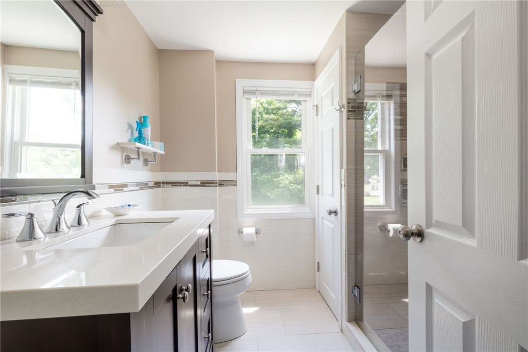 61 Knowles Drive Warwick, RI 02888 - Photo 26 of 43 New stylish full bath with tiled shower