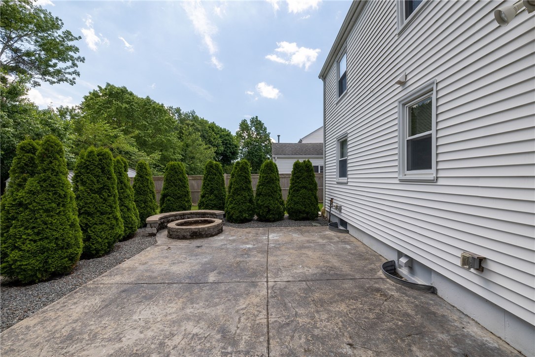 61 Knowles Drive Warwick, RI 02888 - Photo 32 of 43 Large patio with firepit for nights under the stars
