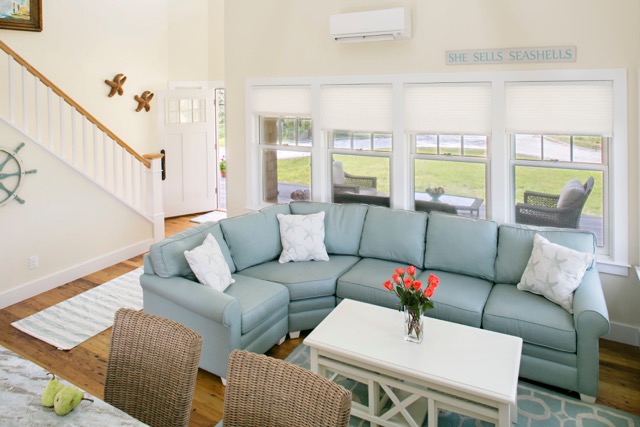 9 Dunes Road Edgartown, MA 02539 - Photo 8 of 12 a living room with furniture and a large window