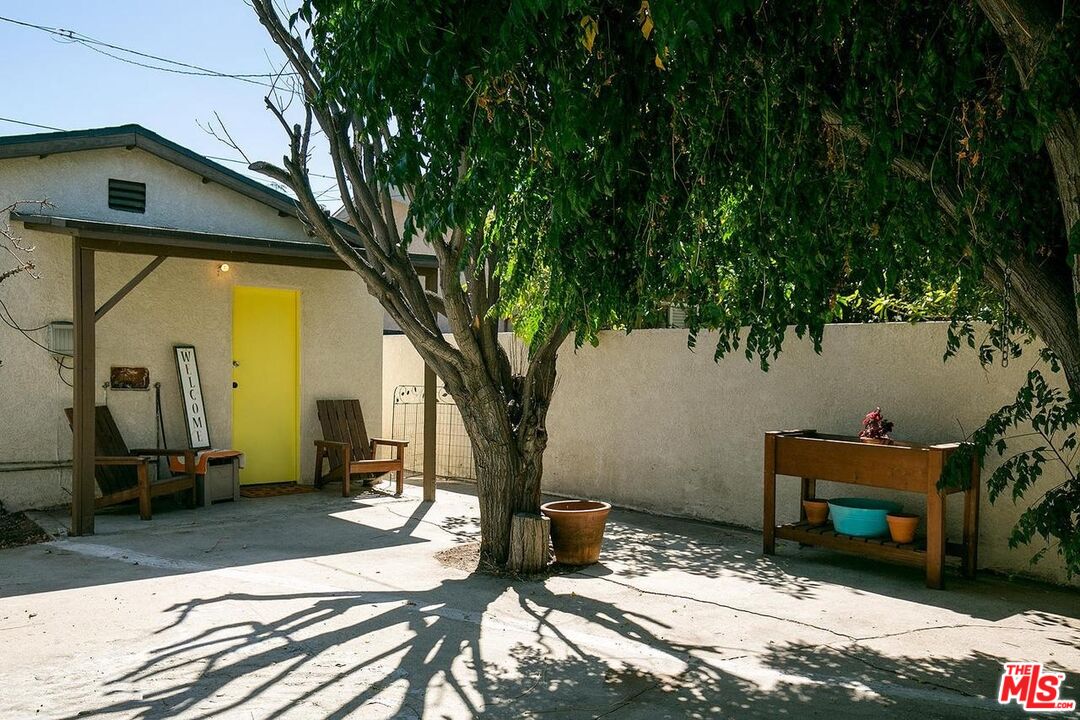 13160 Mercer Street Pacoima, CA 91331 - Photo 2 of 2 a front view of a house with a yard