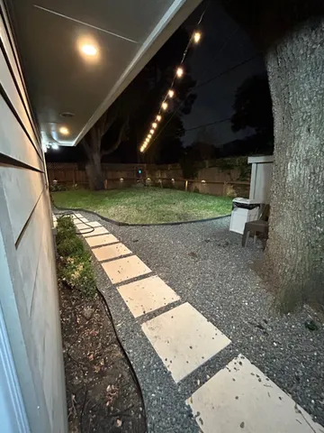 a view of a porch with a yard