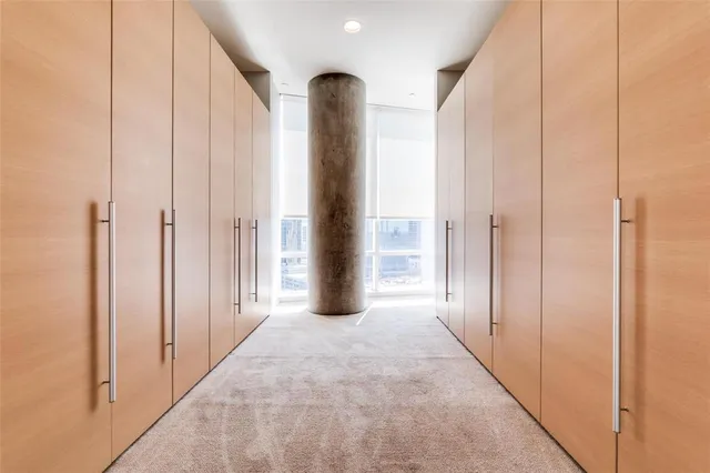 a large white tub sitting in a bathroom