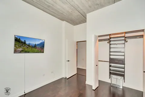 a view of front door with wooden floor
