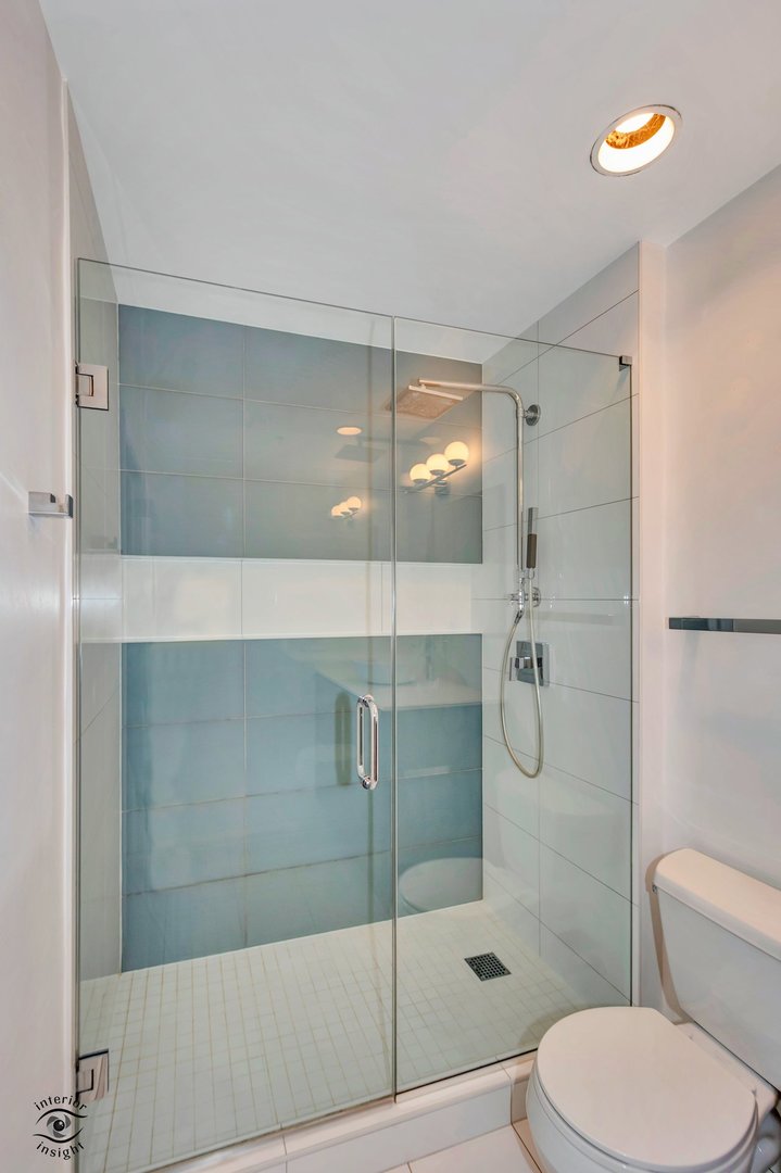845 North Kingsbury Street, Unit 211 Chicago, IL 60610 - Photo 16 of 26 a bathroom with a toilet and a shower