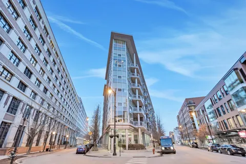 a view of a building with sitting area