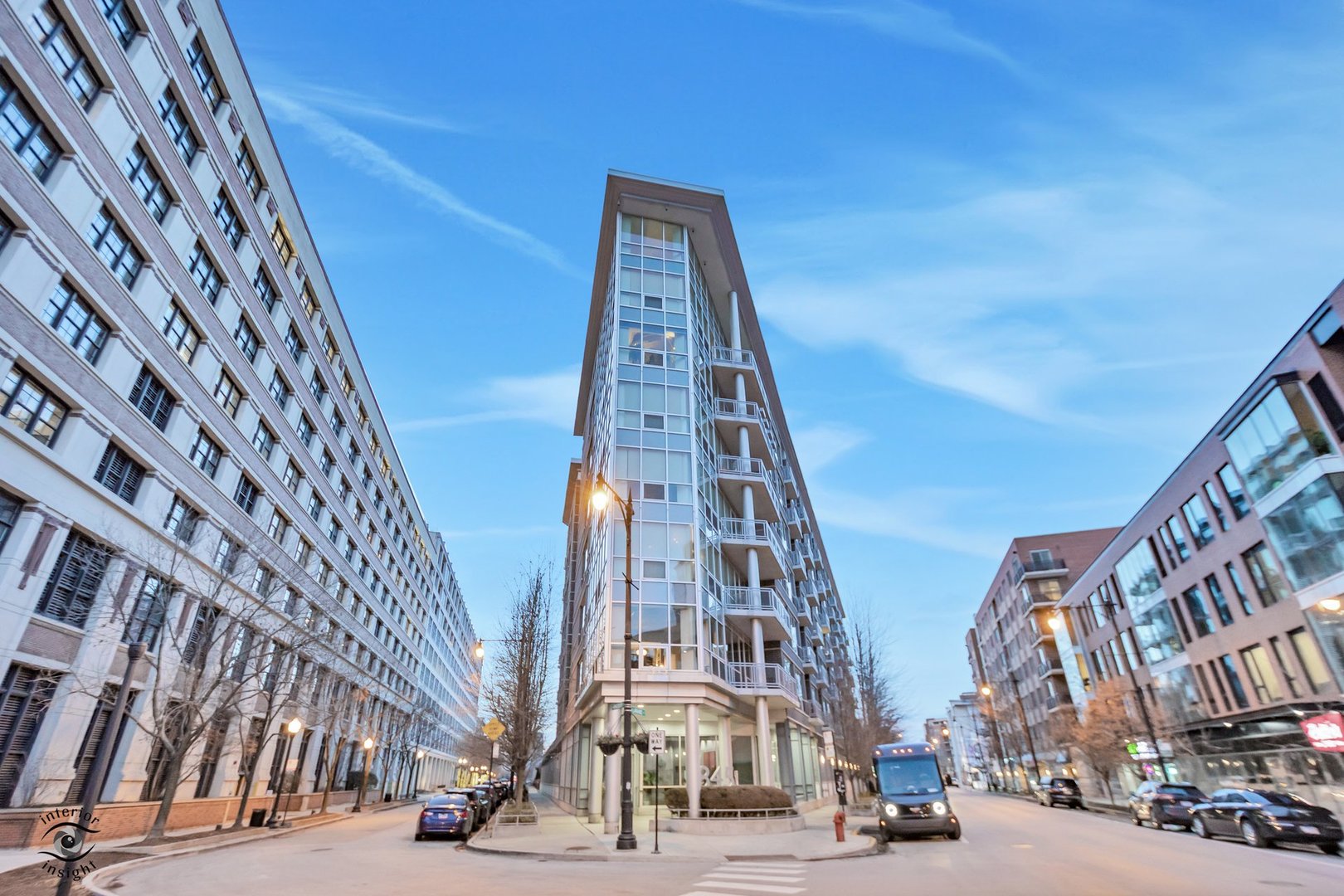 845 North Kingsbury Street, Unit 211 Chicago, IL 60610 - Photo 24 of 26 a view of a tall building next to a road