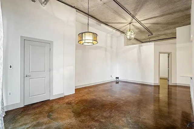 a view of a room with wooden walls