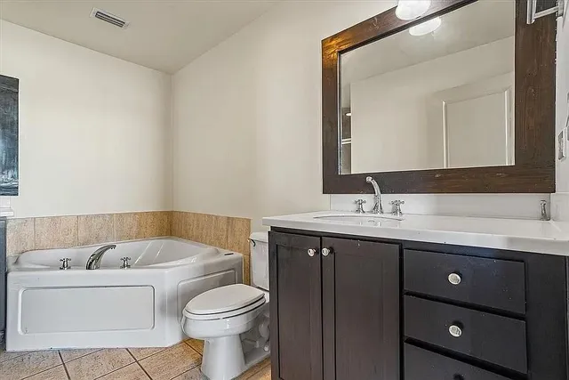 a bathroom with a sink and a toilet