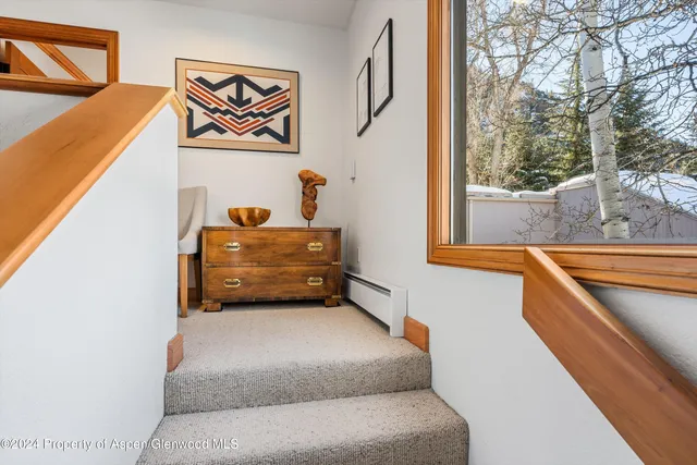 a terrace with a table and chairs