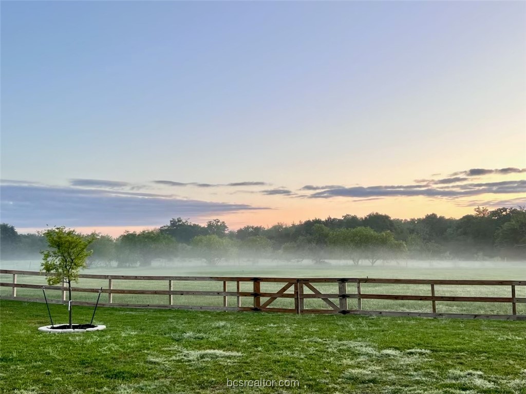 6488 Garhole View Lane Bryan, TX 77808 - Photo 8 of 10 a view of outdoor space with yard and outdoor seating