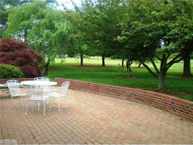 8624 Hudson James Road Summerfield, NC 27358 - Photo 2 of 15 View. Enjoy dining and entertaining on this oversized brick patio overlooking the deep front yard with mature trees and plants.