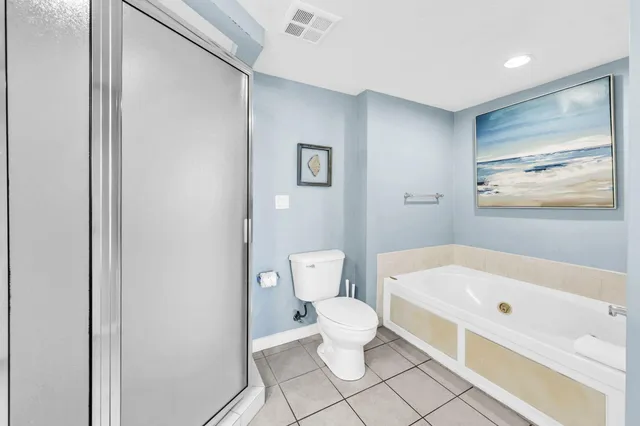 a view of a balcony with table and chairs