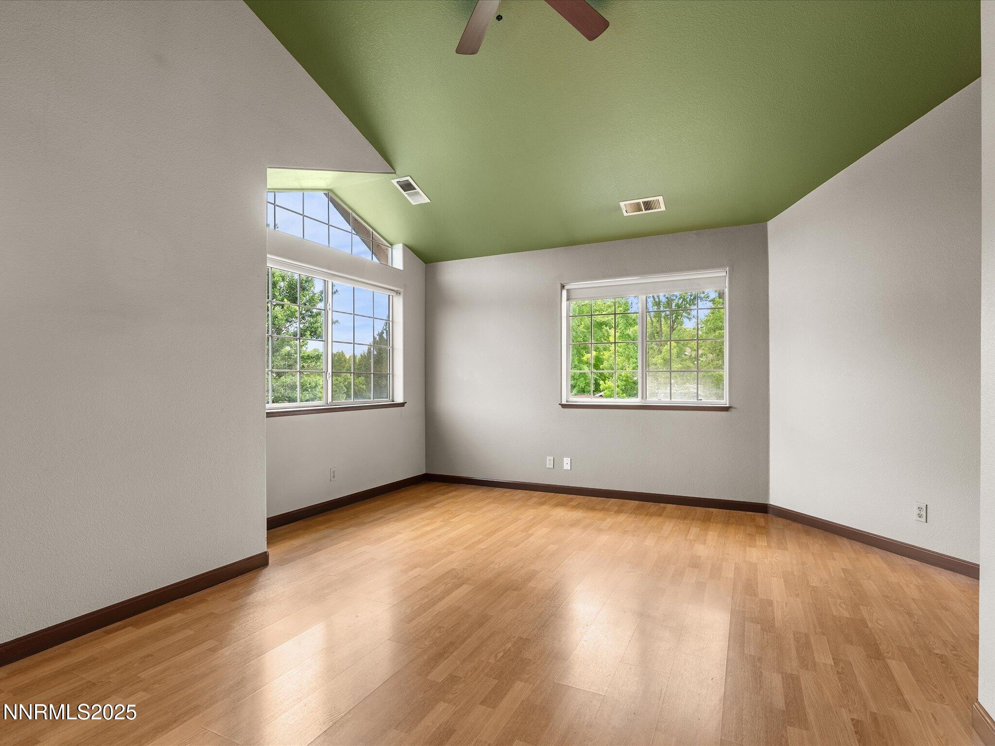 450 Len Circle Reno, NV 89511 - Photo 29 of 44 an empty room with windows