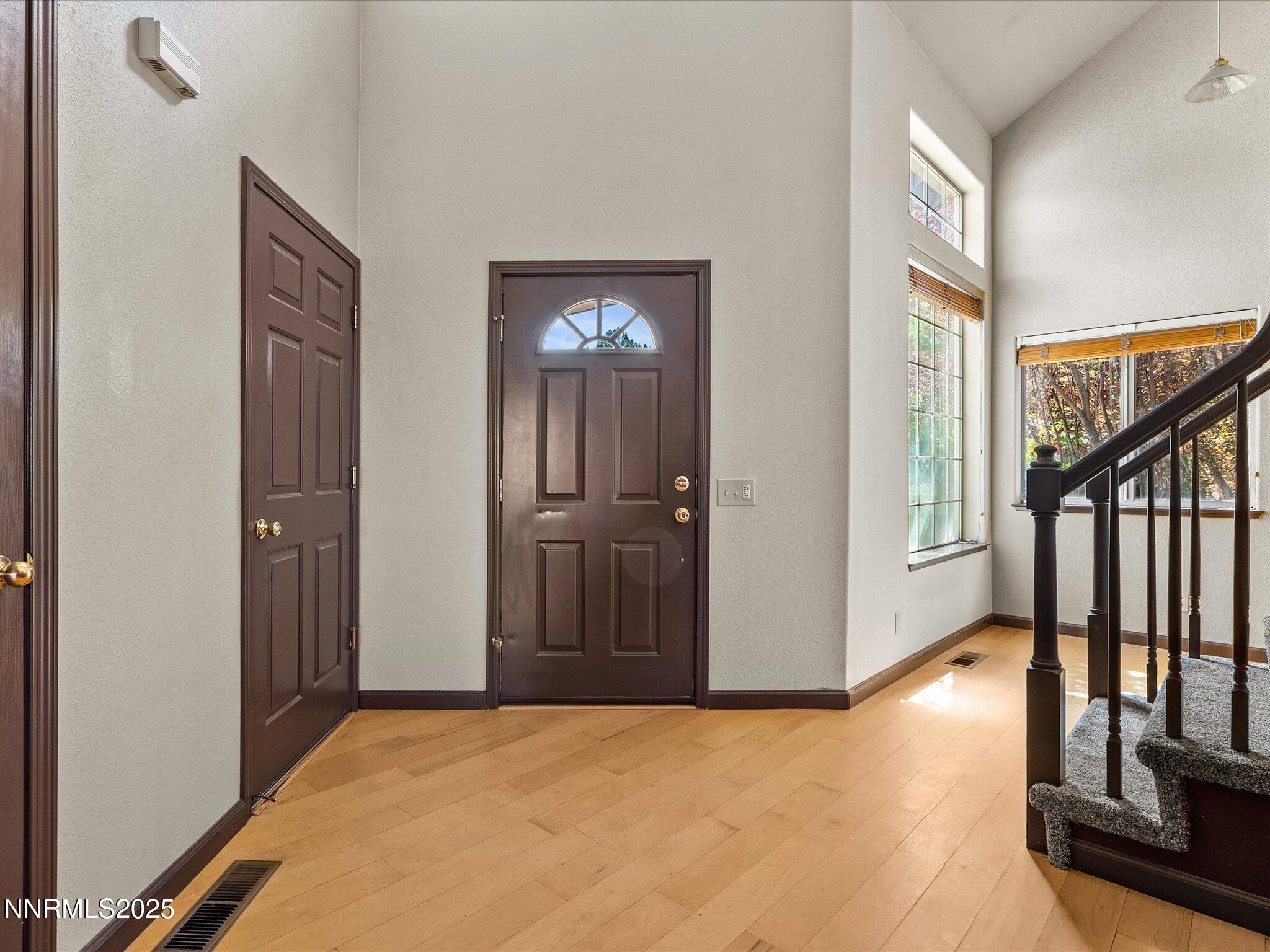 450 Len Circle Reno, NV 89511 - Photo 7 of 44 a view of an entryway with livingroom