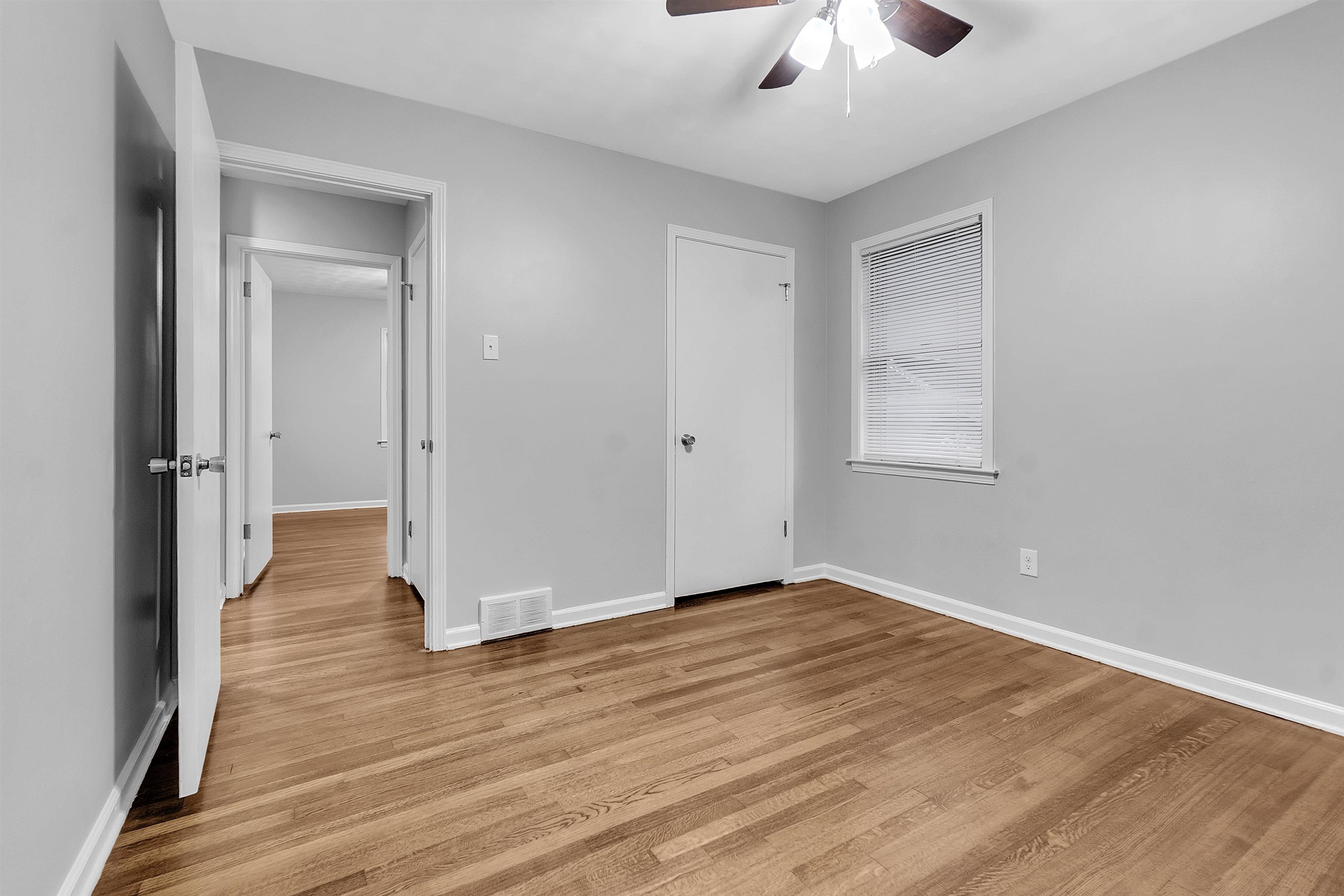 4155 Coventry Drive Memphis, TN 38127 - Photo 12 of 20 wooden floor in an empty room with a window