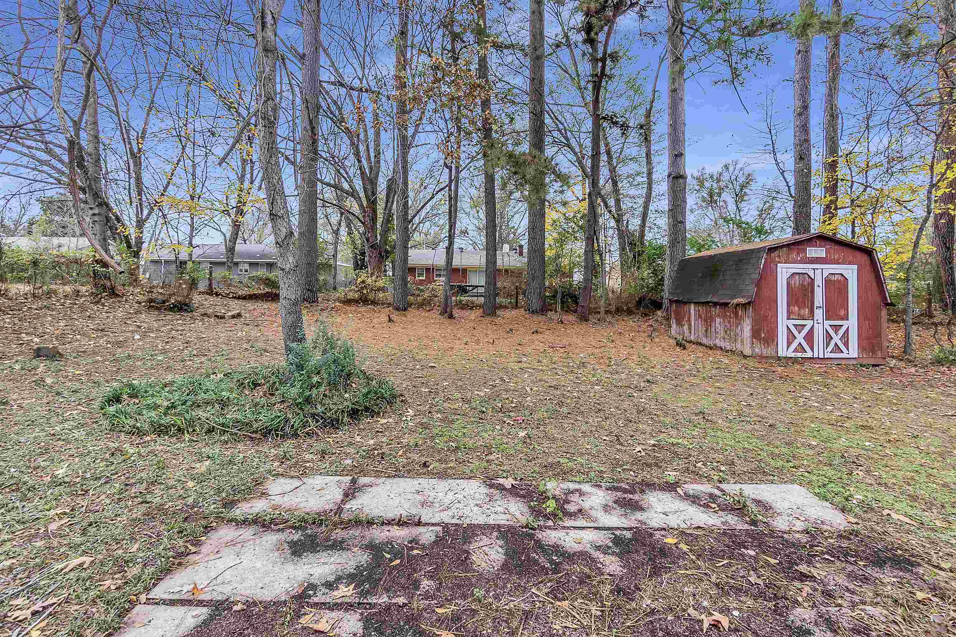 4155 Coventry Drive Memphis, TN 38127 - Photo 17 of 20 a view of a street with a building in the background