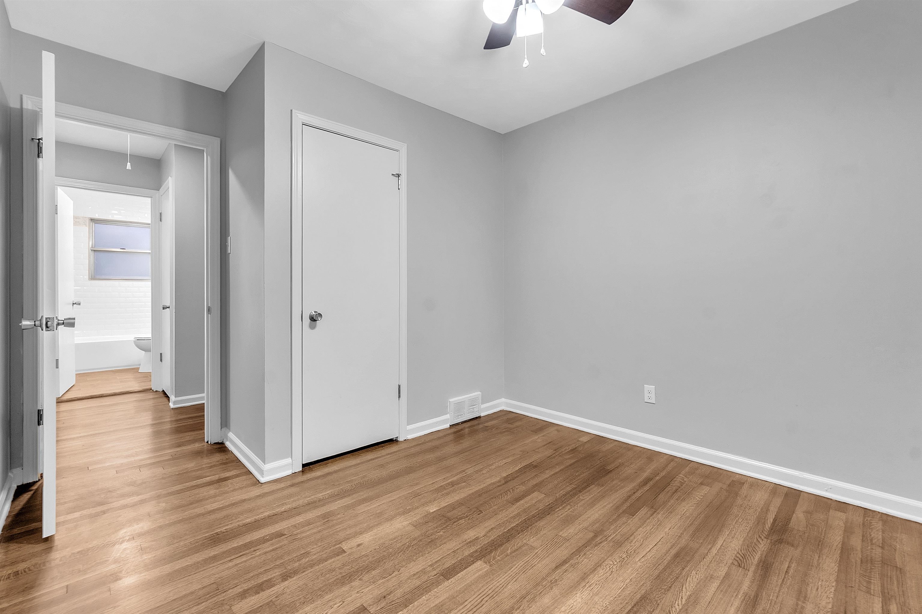 4155 Coventry Drive Memphis, TN 38127 - Photo 20 of 20 wooden floor in an empty room with a window