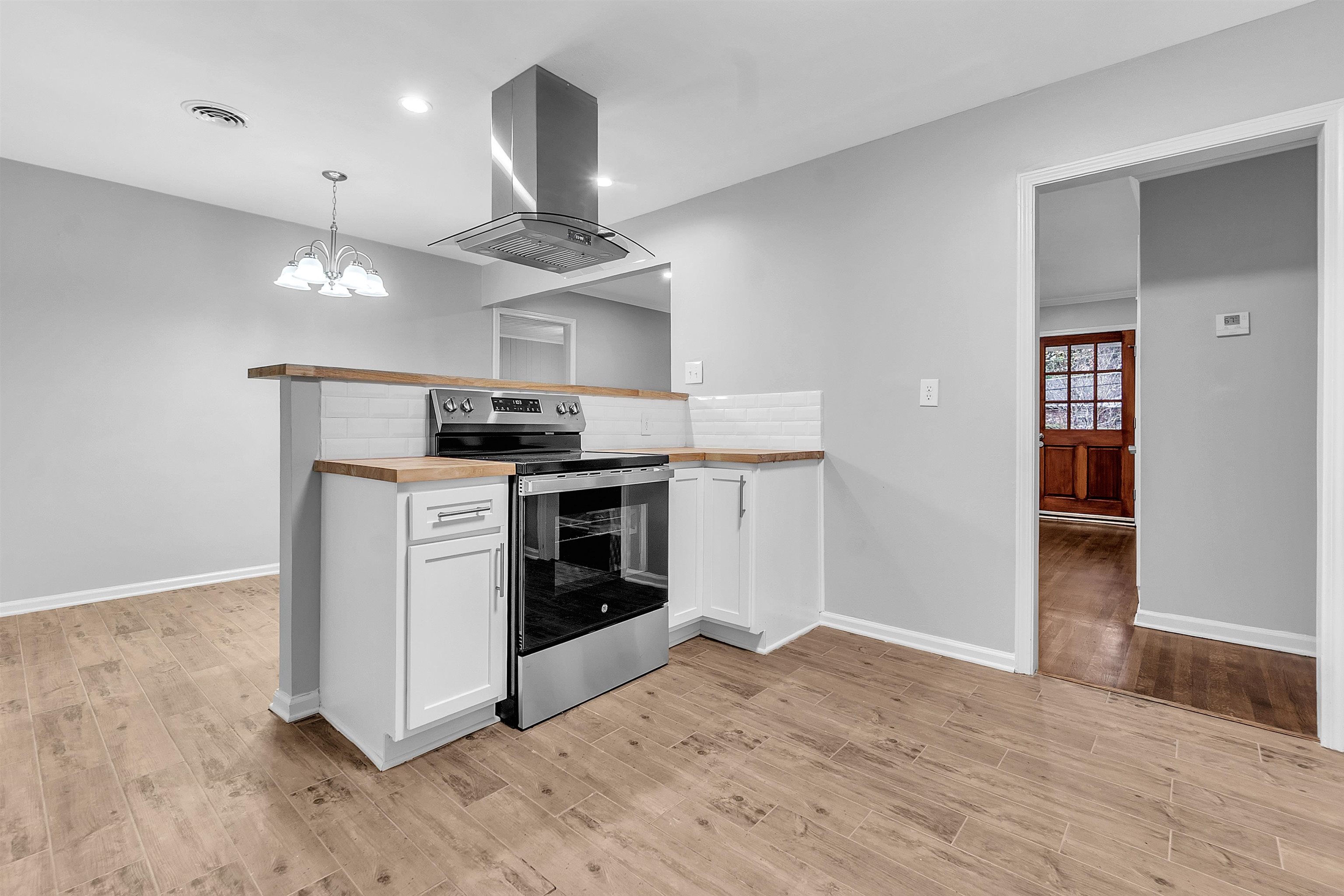 4155 Coventry Drive Memphis, TN 38127 - Photo 9 of 20 a kitchen with stainless steel appliances granite countertop a stove and a sink