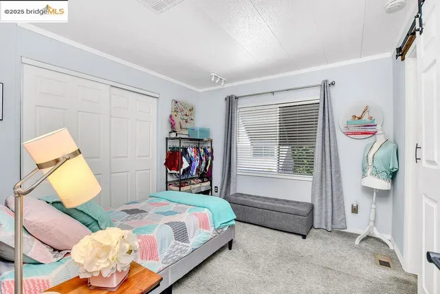 a kitchen with a stove and a refrigerator