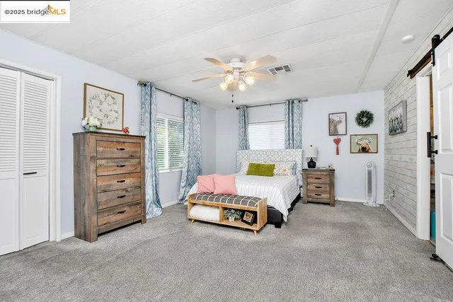 a bathroom with a sink toilet and a shower