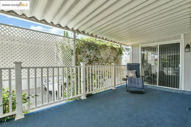 a view of porch with furniture