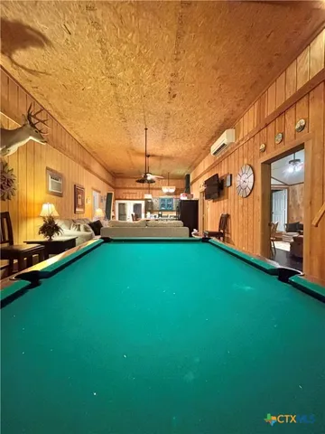 a view of living room kitchen with furniture and floor to ceiling window