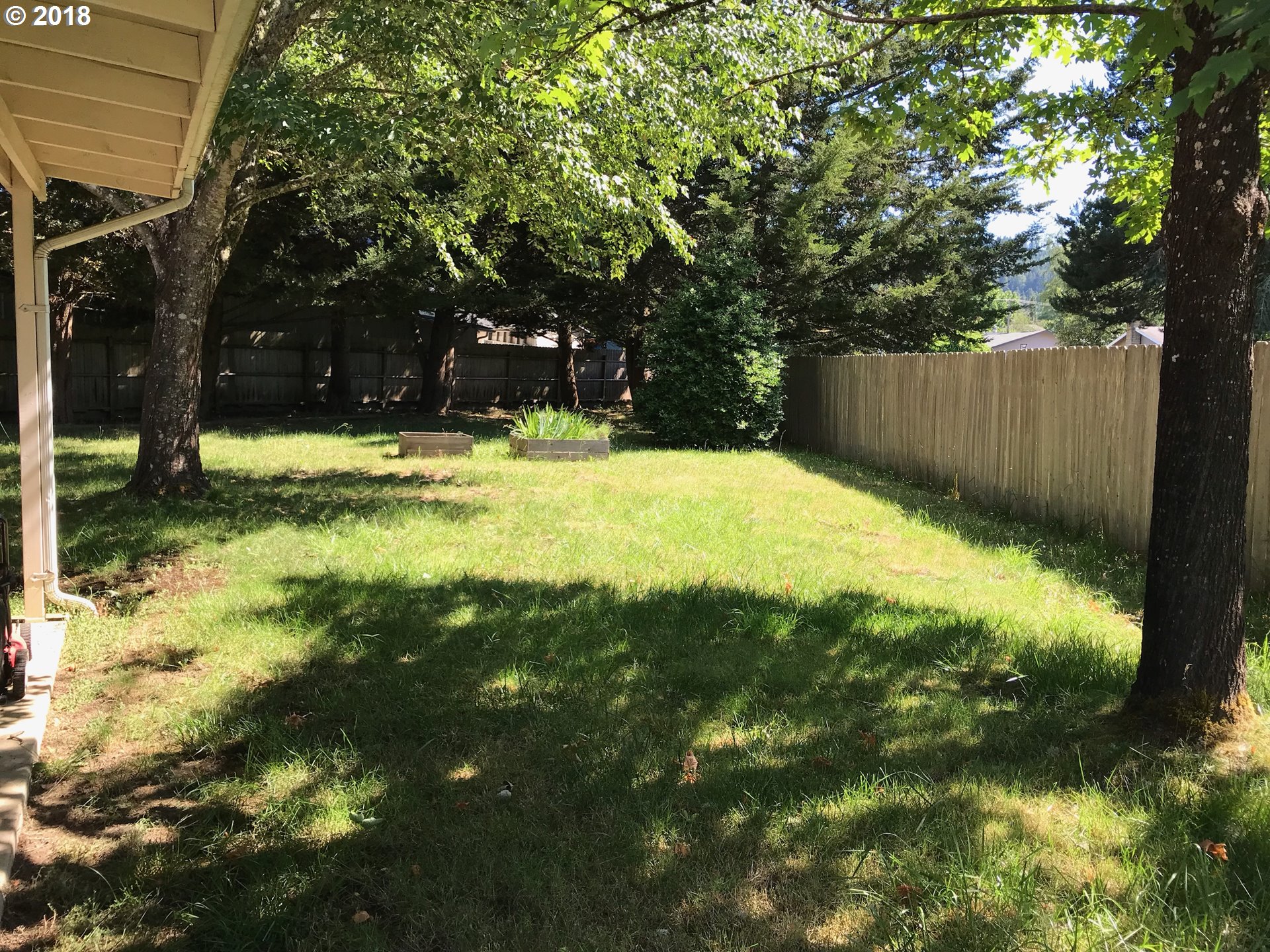 292 72nd Place Springfield, OR 97478 - Photo 10 of 12 a view of swimming pool with an outdoor space and seating area