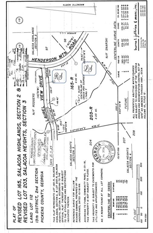 5997 Henderson Mountain Road Jasper, GA 30143 - Photo 2 of 11 a black and white photo of a book
