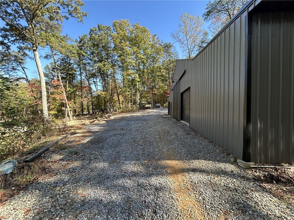 5997 Henderson Mountain Road Jasper, GA 30143 - Photo 7 of 11 a view of backyard with green space