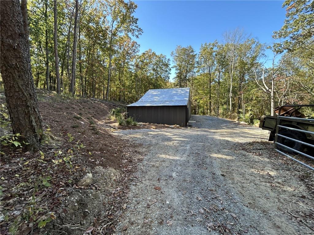 5997 Henderson Mountain Road Jasper, GA 30143 - Photo 8 of 11 a view of outdoor space with deck and outdoor seating