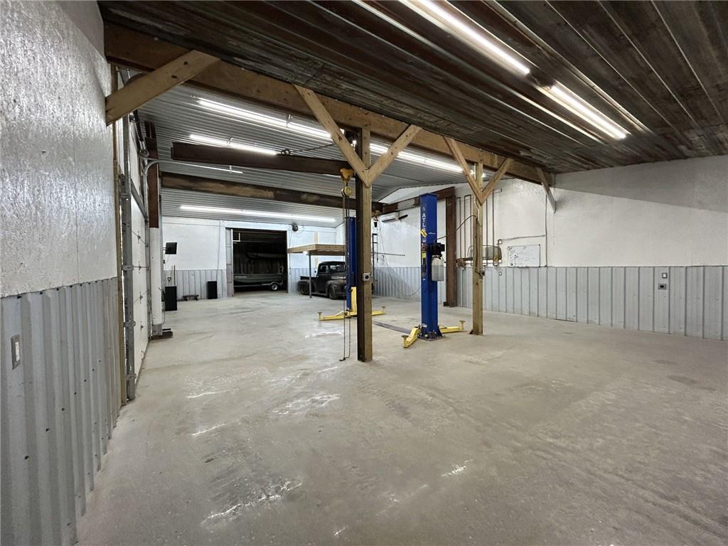 5997 Henderson Mountain Road Jasper, GA 30143 - Photo 10 of 11 a view of empty room with wooden ceiling