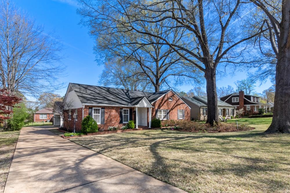 5580 Normandy Road Memphis, TN 38120 - Photo 1 of 25 a view of house with trees in front of it