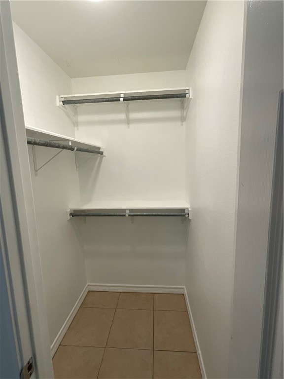 15330 Cruiser Street, Unit A Corpus Christi, TX 78418 - Photo 14 of 20 a view of an empty walk in closet