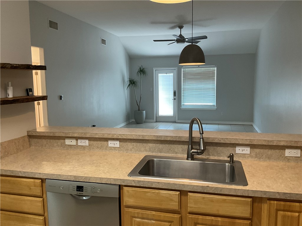 15330 Cruiser Street, Unit A Corpus Christi, TX 78418 - Photo 4 of 20 a close view of a sink and a faucet in the kitchen