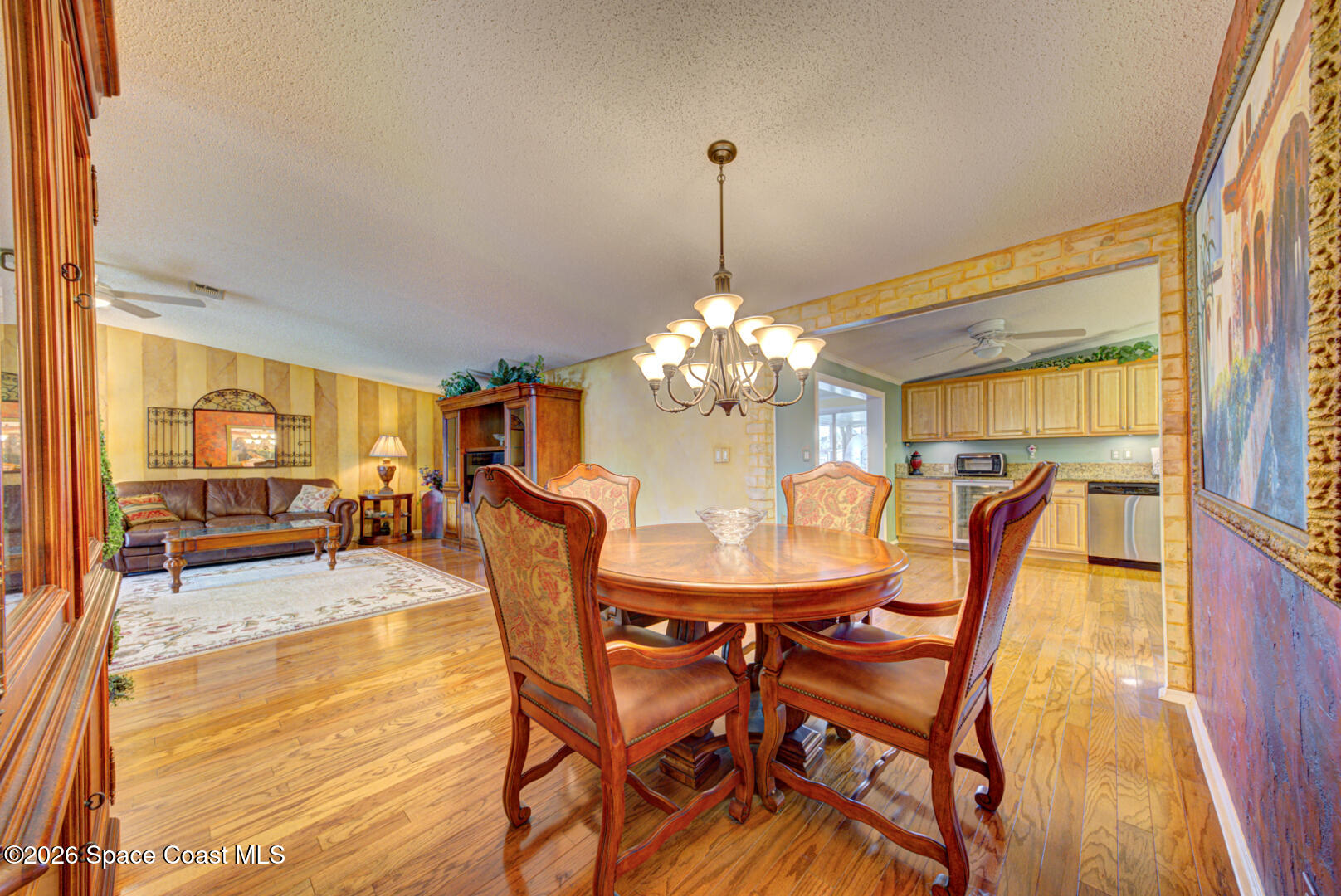 176 Woodsmill Boulevard, Unit 177 Cocoa, FL 32926 - Photo 30 of 63 28 dining room with chandelier
