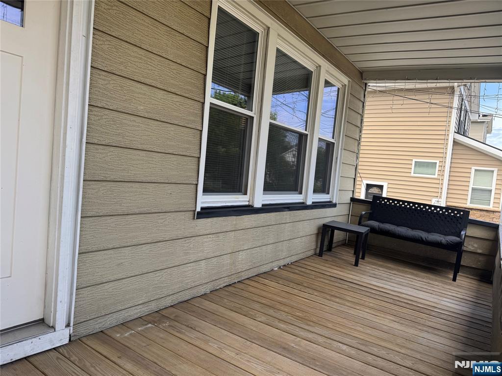 138 Carlton Avenue East Rutherford, NJ 07073 - Photo 14 of 14 a bench sitting in front of a house