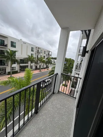 a front view of building with yard