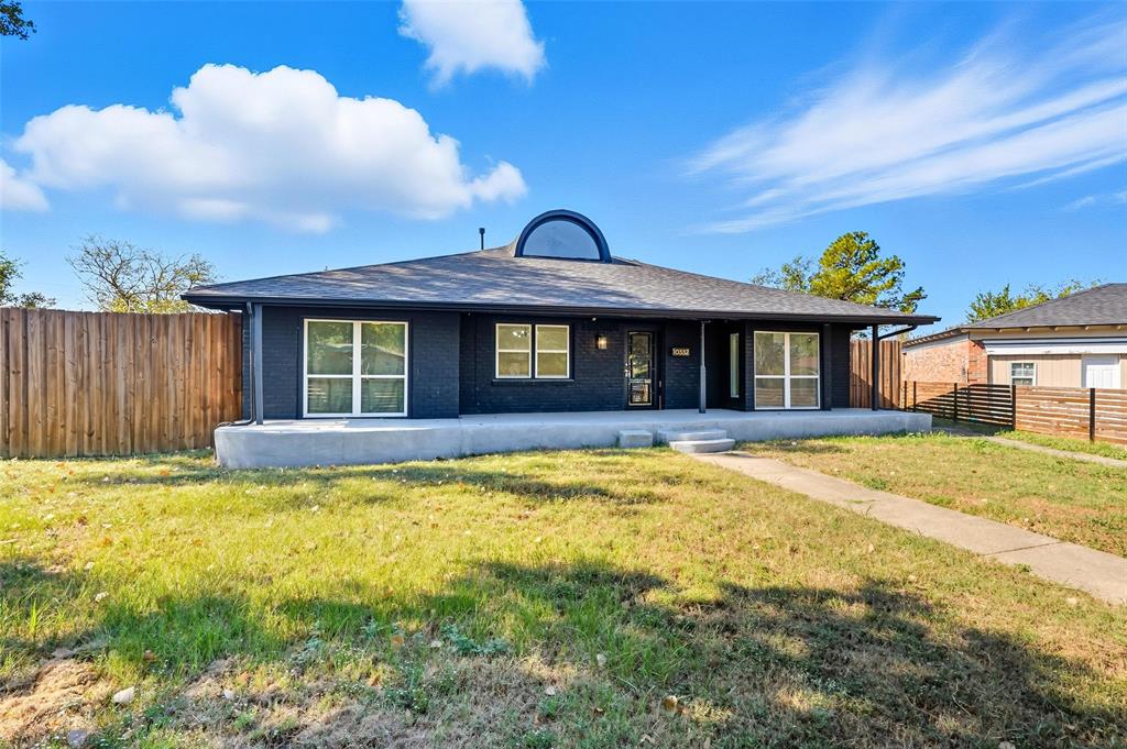 10332 Muskogee Circle Dallas, TX 75217 - Photo 2 of 39 a view of a house with a swimming pool